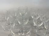 a lot of empty wine glasses on the table