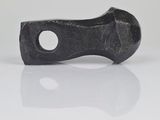 a black object that is sitting on a white surface