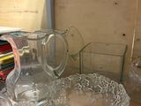 many glass items on the table in the room