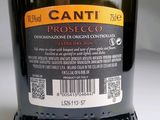 a close up of a bottle of wine on a table