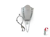 necklace and bracelet with turquoise beads on display on white background