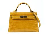 yellow leather handbag on white background with clipping for text