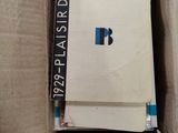 a book in a box that is sitting on top of some boxes