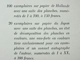 a close up of a page of a book with a picture of a clock