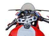 a close up view of a motorcycle ' s dashboard and handlebars