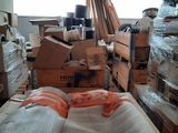 a large pile of boxes and other items in a room