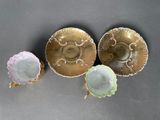 three different types of dishes are sitting on a table