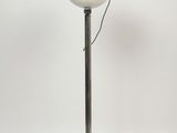 an image of a lamp that is on a metal pole