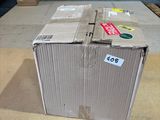 a cardboard box sitting on the floor in a room