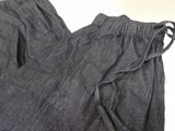 a close up of a pair of jeans on a table