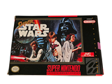 a box of star wars super nintendo games on the table