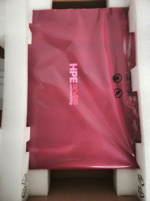 a pink bag in a white box on a table