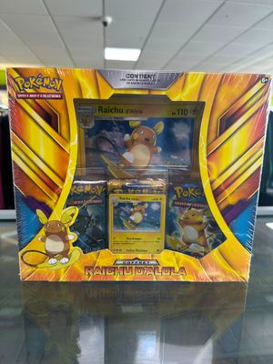 a box of pokemon cards sitting on top of a table