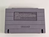 a close up of a nintendo game console sitting on a table