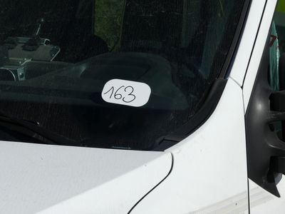 a white van with a sticker on the side of it
