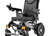 a close up of an electric wheelchair on a white background