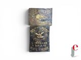 an old metal box with a label on it