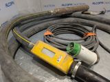 two hoses and a meter on a table