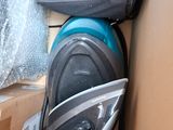a box with a vacuum and other items in it