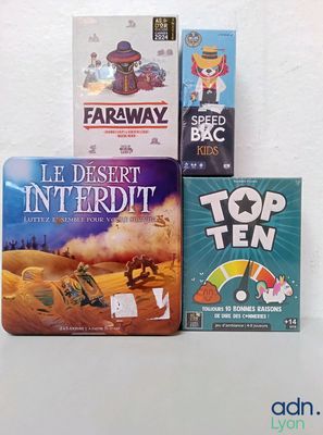 trois jeux de société pour enfants posés sur une table