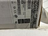 a box that has a pair of scissors in it