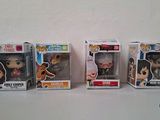 three funko pop vinyl figures are lined up on a table