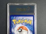 a close up of a pokemon card in a plastic case