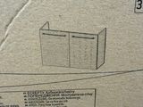 a cardboard box with a picture of a cat inside of it