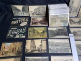 a lot of old postcards sitting on a table