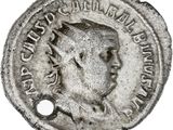 a close up of a coin with a man ' s face on it