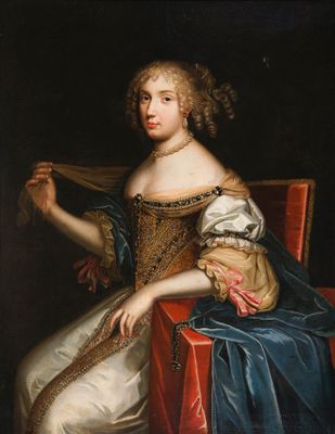 portrait of a lady seated in a red chair with a blue and white dress