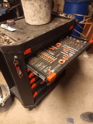 a workbench with tools on it in a garage