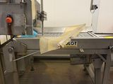 a picture of a conveyor belt in a factory