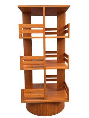 an image of a wooden book shelf with shelves