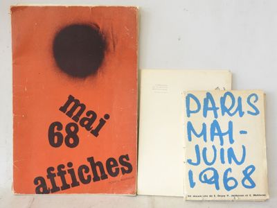 two books are sitting on a table next to each other