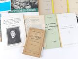 many books on the table with pictures on them