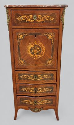 an antique wooden chest of drawers with a decorative decoration