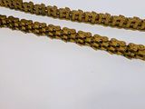 two chains that are sitting on a table