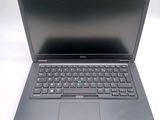 a laptop computer that is sitting on a table