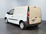 a white van that is parked in a room