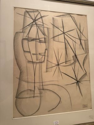 dessin représentant le visage d'un homme dans un vase, avec un effet d'étoiles en arrière-plan