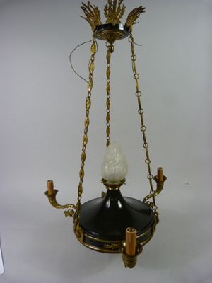 a black and gold chandelier hanging from a ceiling