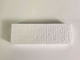 a piece of white paper on a white surface