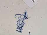 a white plate with a picture of a giraffe on it