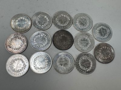 a lot of coins that are sitting on a table