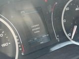 a close up of a car dashboard with a speedometer