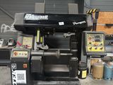 a picture of a machine that is sitting in a garage