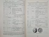 an open book with a list of coins on it