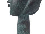 statue of a woman ' s head with a large open mouth