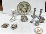 many different pieces of porcelain on the table